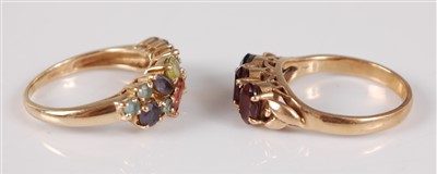 Lot 2664 - A 9ct yellow gold multi-stone ring, featuring...