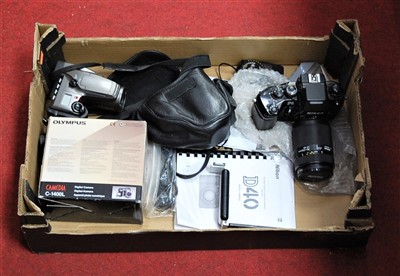 Lot 68 - An Olympus Camedia C-1400 L digital camera,...