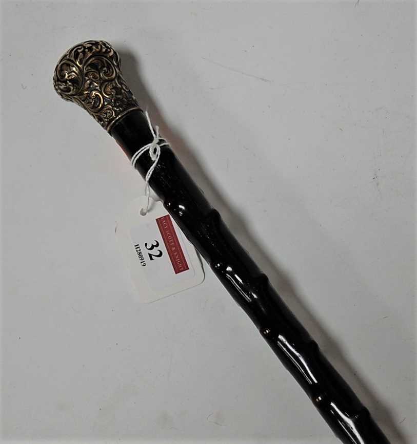 Lot 32 - A late Victorian walking cane having a...