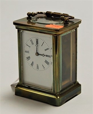 Lot 231 - A lacquered brass cased carriage clock having...