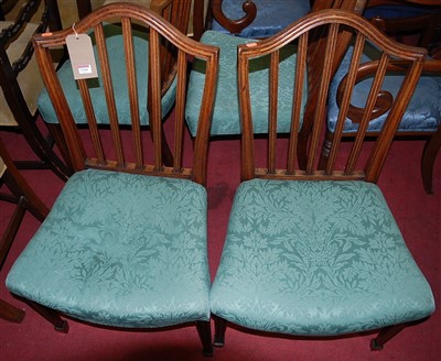 Lot 1344 - A set of four mahogany stickback dining chairs,...