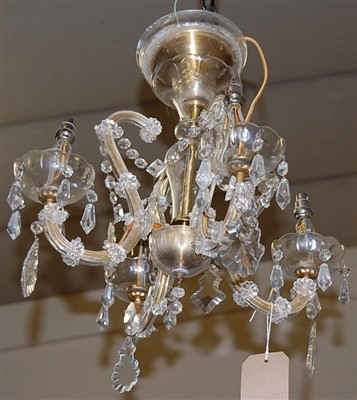 Lot 1265 - A cut crystal glass hanging four light...