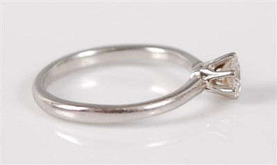 Lot 2673 - A contemporary platinum diamond solitaire ring,...