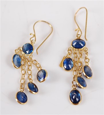 Lot 2683 - A pair of yellow metal and blue sapphire ear...