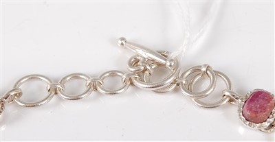 Lot 2692 - A contemporary silver multi-stone set necklet,...