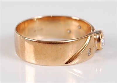 Lot 2687 - A 14ct gold diamond dress ring, arranged as a...