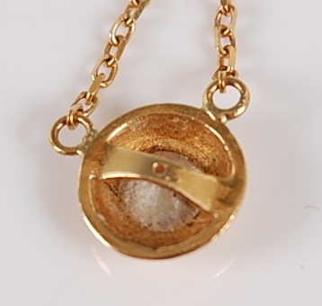 Lot 2691 - A contemporary 18ct gold diamond pendant, the...