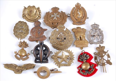 Lot 41 - A collection of mainly Commonwealth cap badges and insignia to include