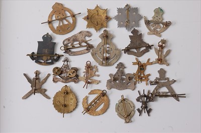 Lot 43 - A collection of mainly Indian/Nepalese Regiment cap badges and insignia to include