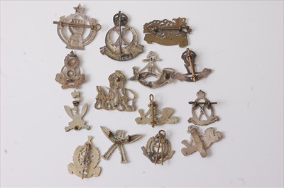 Lot 43 - A collection of mainly Indian/Nepalese Regiment cap badges and insignia to include