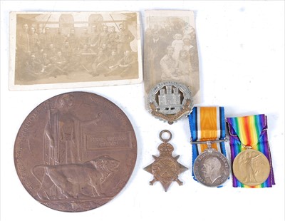 Lot 409 - A WW I Casualty group to include bronze...