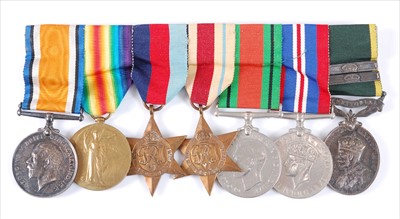 Lot 307 - A group of seven medals to include British War...