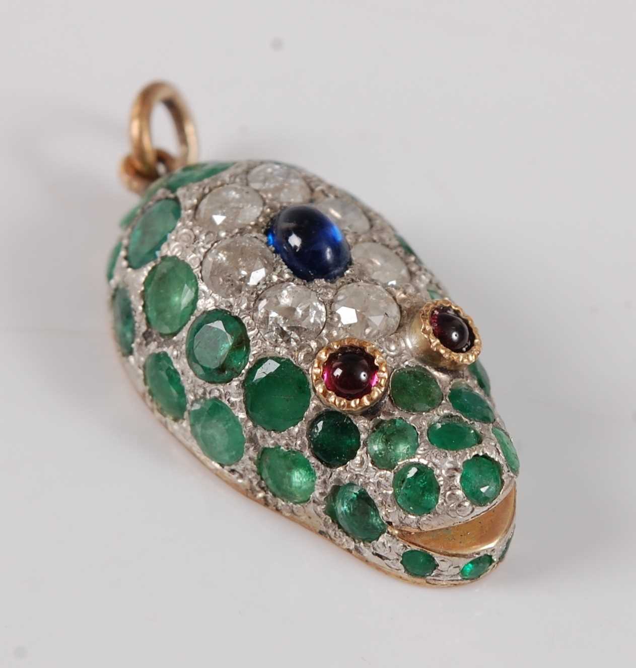Lot 2749 - A yellow and white metal snake head pendant,...