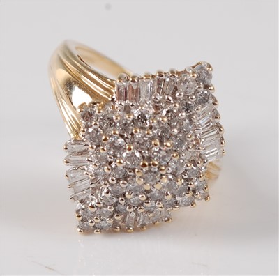 Lot 2760 - A 14ct yellow and white gold diamond marquise...
