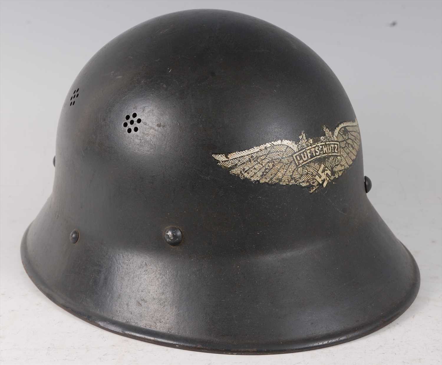 Lot 222 - A German Luftschutz Civil Defence helmet