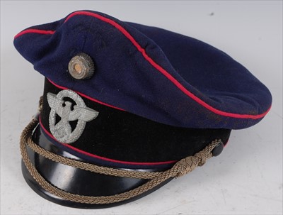 Lot 329 - A WW II style German Fire Police NCO's peaked visor cap