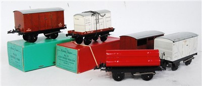 Lot 495 - Five No. 50 Hornby wagons - flat with meat...