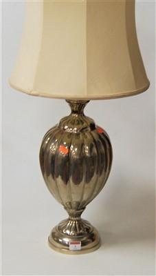 Lot 3 - A modern chromed table lamp of melon form to...