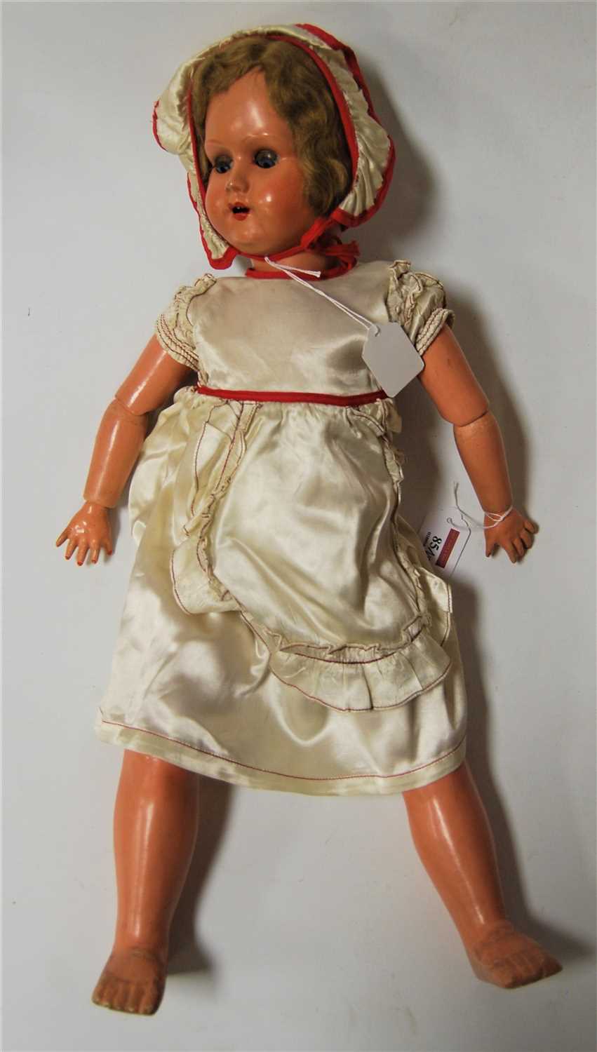 Lot 10 - A mid 20th century continental celluloid doll...