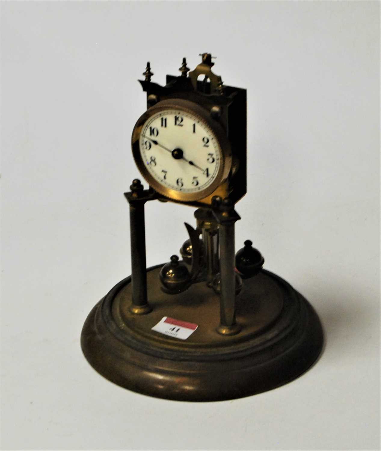 Lot 41 - An early 20th century brass anniversary clock...
