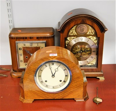 Lot 48 - A 1940s walnut cased mantel clock having a...