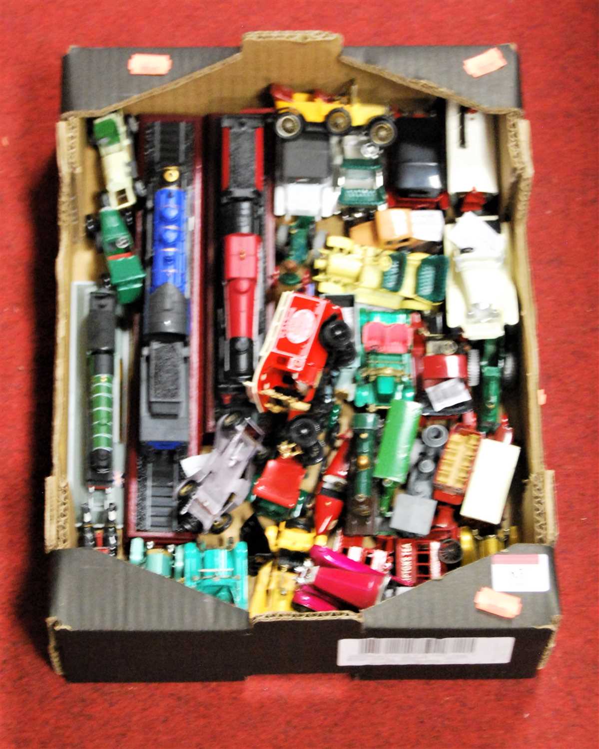 Lot 63 - A box of loose diecast toy vehicles to include...
