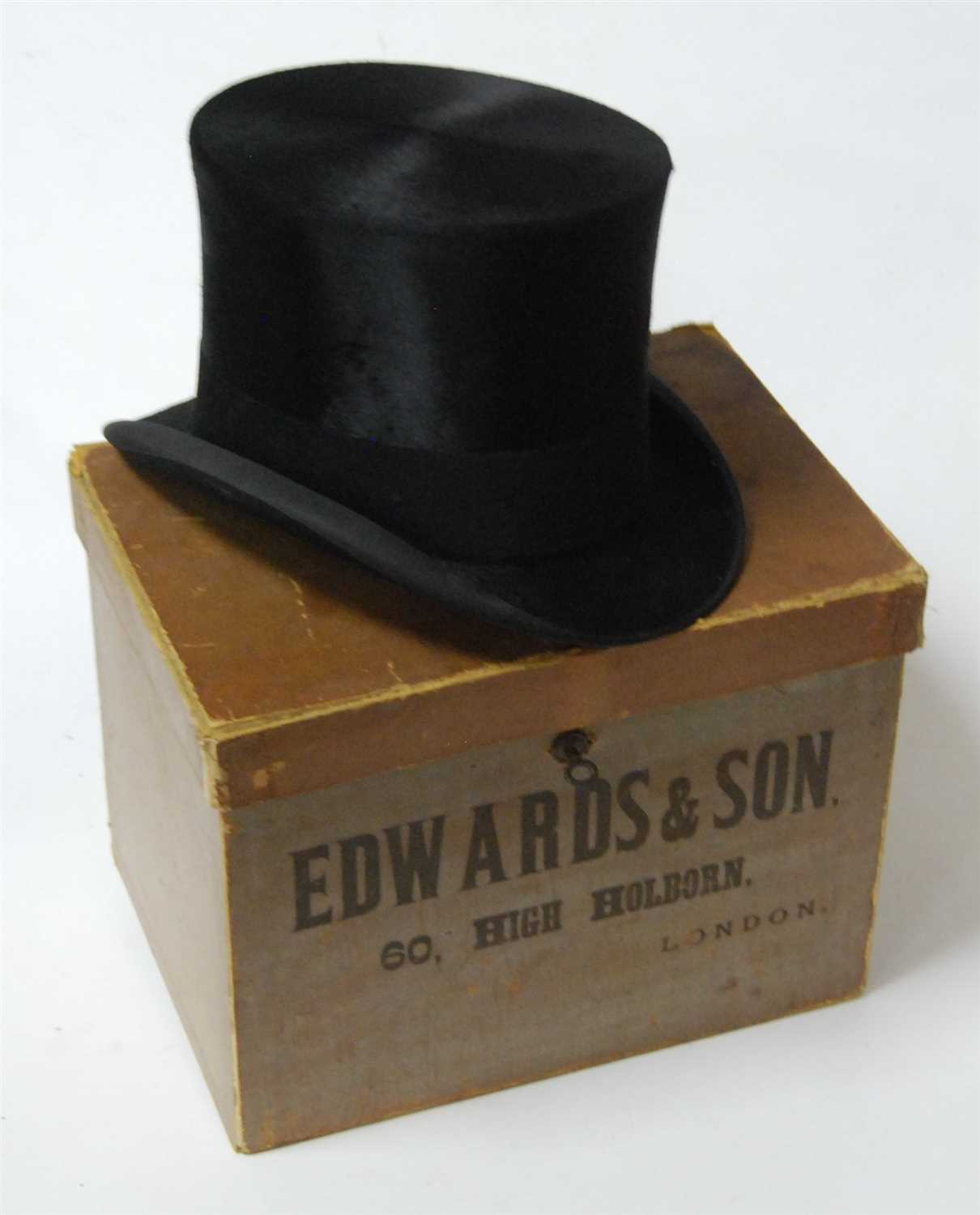 Lot 90 - An Edwardian brushed velvet top hat, bearing a...