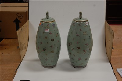 Lot 96 - A pair of Chinese vases and covers, each on...