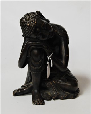 Lot 98 - A modern resin figure of a Deity, in seated...