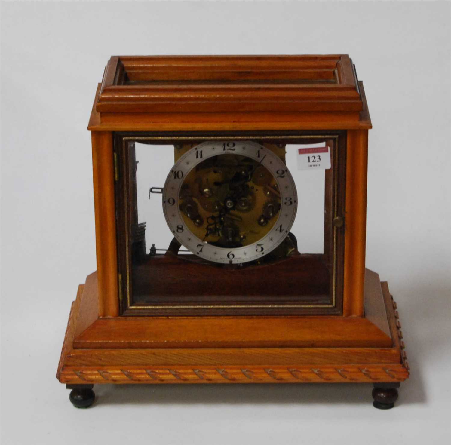 Lot 123 - A modern oak cased Anvil skeleton clock,...