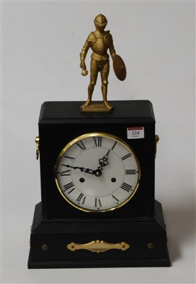 Lot 124 - A modern black painted mantel clock, having a...