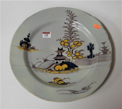 Lot 128 - An 18th century English Delft charger,...