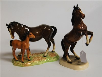 Lot 186 - A Beswick model of a horse and foal, brown...