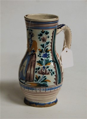 Lot 201 - A 19th century Dutch Delft jug, decorated with...