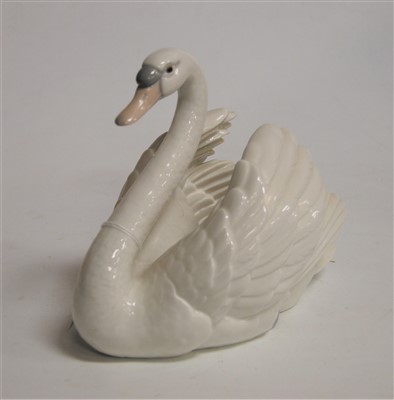Lot 209 - A Lladro blanc de chine figure of a swan...