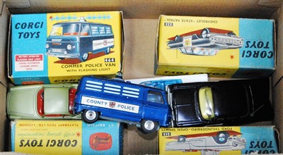 Lot 1631 - Four various boxed and playworn Corgi Toy...