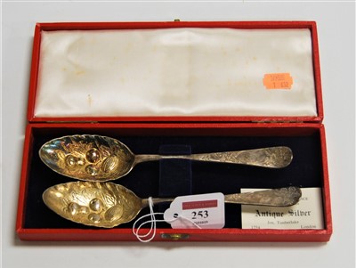 Lot 253 - A pair of silver berry spoons, the gilt-washed...