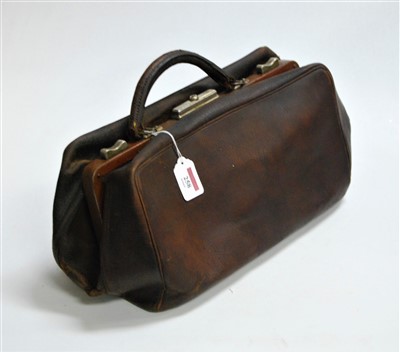 Lot 258 - A brown leather Gladstone bag