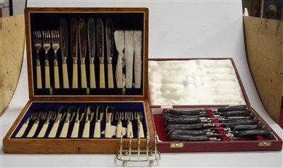 Lot 266 - A boxed set of six antler handled steak knives...