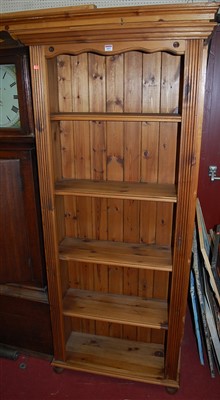 Lot 1092 - A modern pine freestanding open bookshelf, w.81cm
