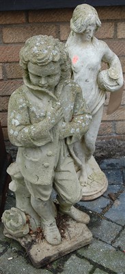 Lot 1129 - A reconstituted stone garden figure of a...