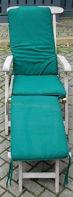 Lot 1127 - A contemporary slatted teak garden armchair,...
