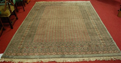 Lot 1139 - A Persian woollen Bokhara rug, having a...