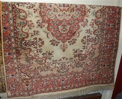 Lot 1148 - A Persian cream ground Tabriz, the central...