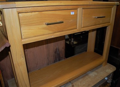 Lot 1201 - A contemporary light oak two drawer two-tier...