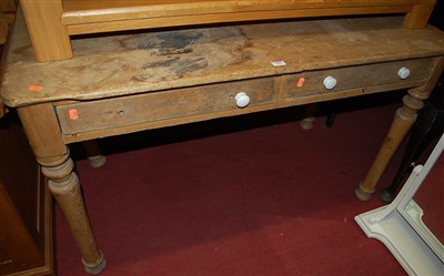 Lot 1203 - A Victorian pine round cornered two drawer...