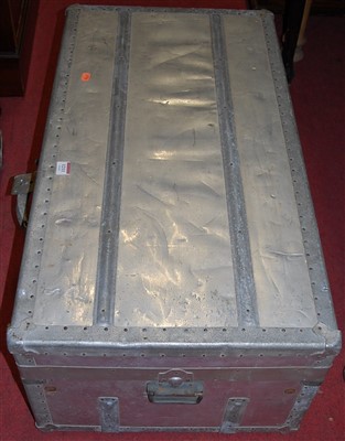 Lot 1211 - An early 20th century aluminium clad luggage...