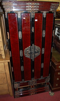 Lot 1220 - A contemporary Japanese black/red lacquered,...