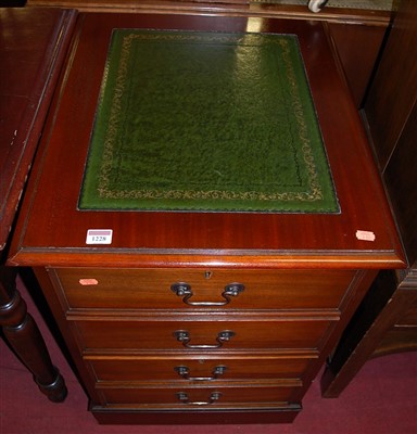 Lot 1228 - A reproduction mahogany and gilt tooled green...