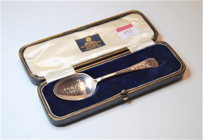 Lot 332 - A George V silver spoon having a bright cut...